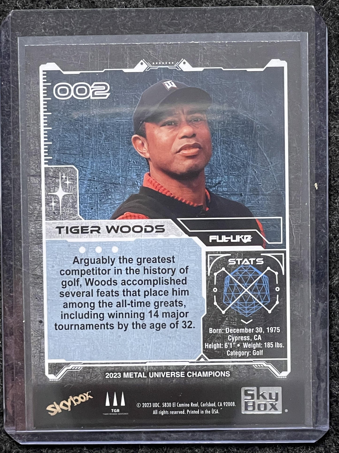2023 SkyBox Metal Universe Champions #002 Tiger Woods