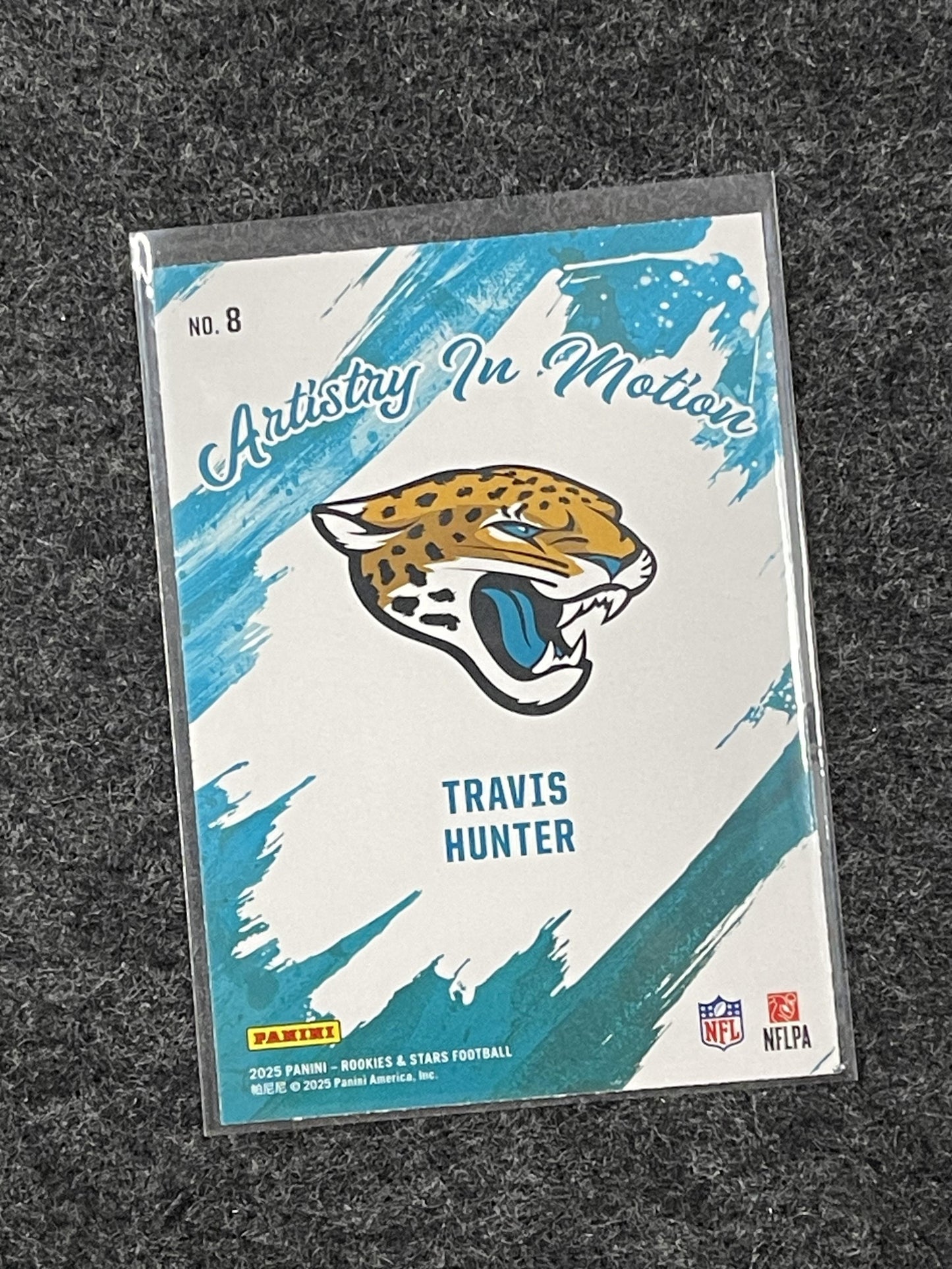 2025 Panini Rookies & Stars #8 Travis Hunter Artistry in Motion Jax
