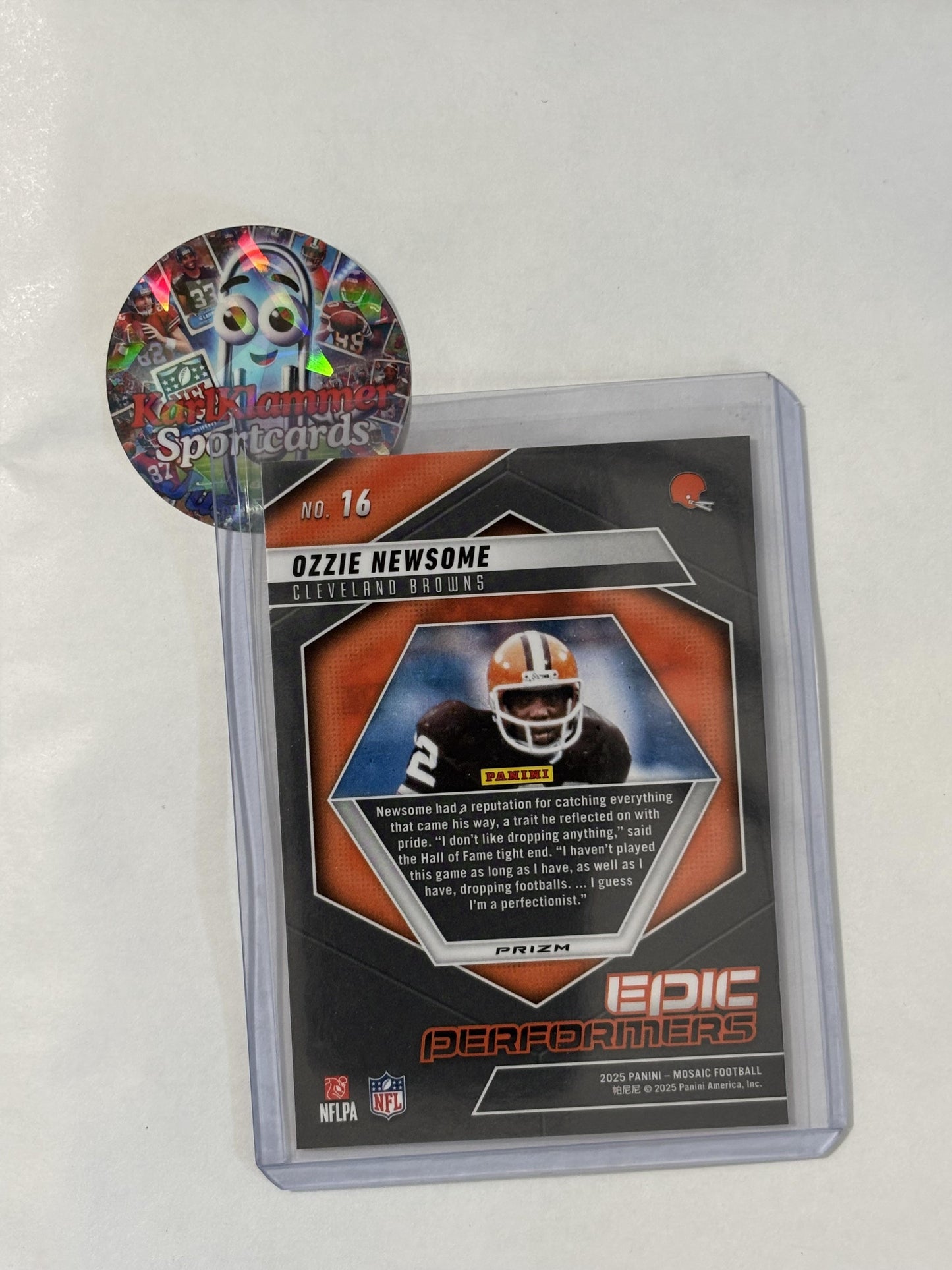 2025 Panini Mosaic #16 Ozzie Newsome Epic Performers Mosaic Orange Fluorescent Cleveland Browns