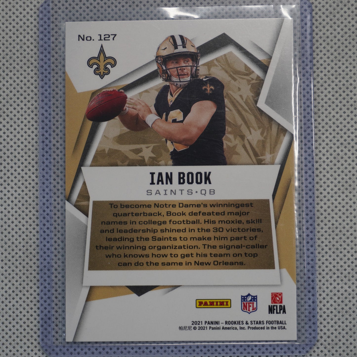 2021 Panini Rookies & Stars #127 Ian Book True Blue #/49 New Orleans Saints SN,RC