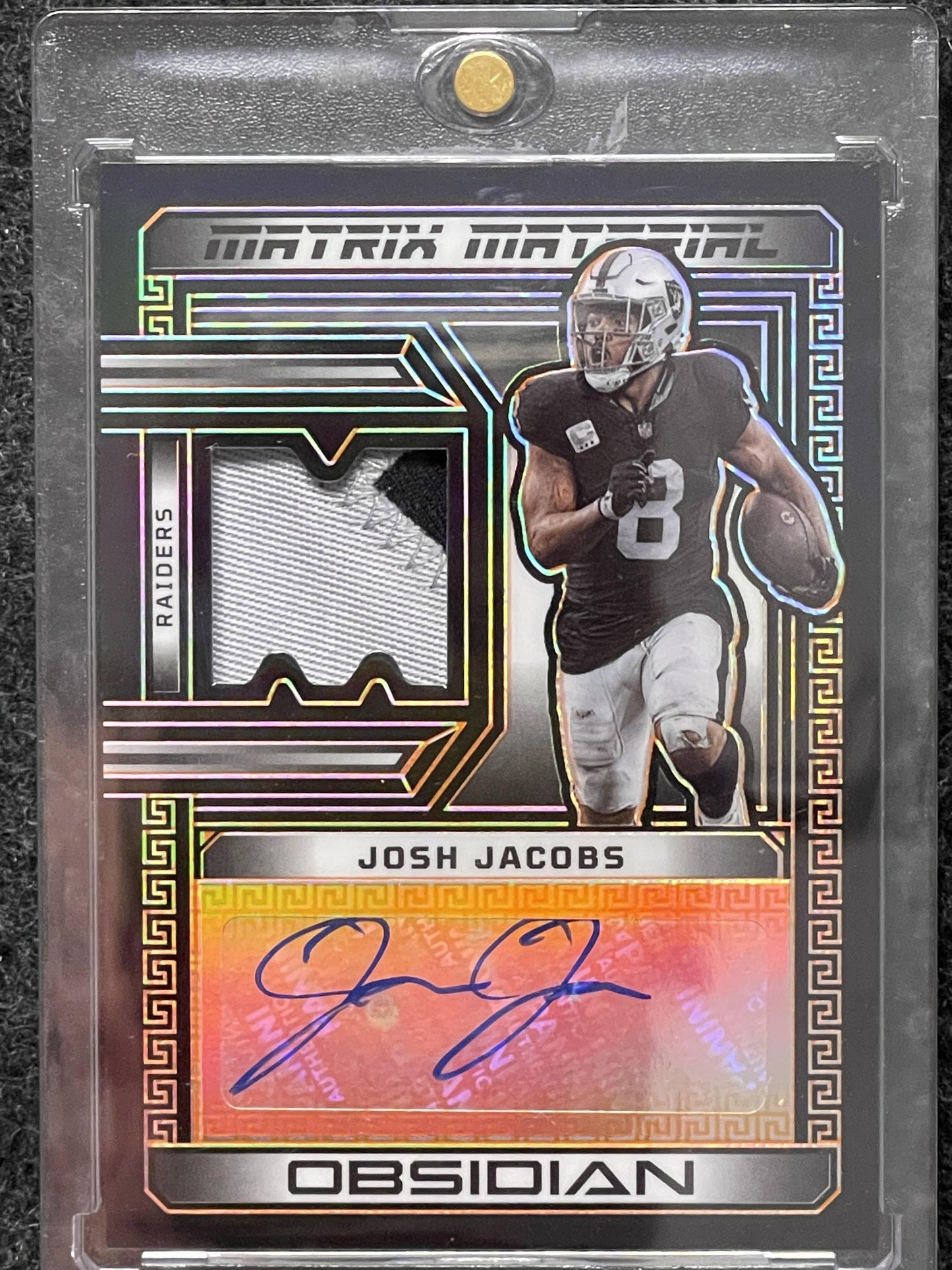 23 Panini Obsidian #MMA-JJA Josh Jacobs Patch Auto ElectricEtchOrange #/49