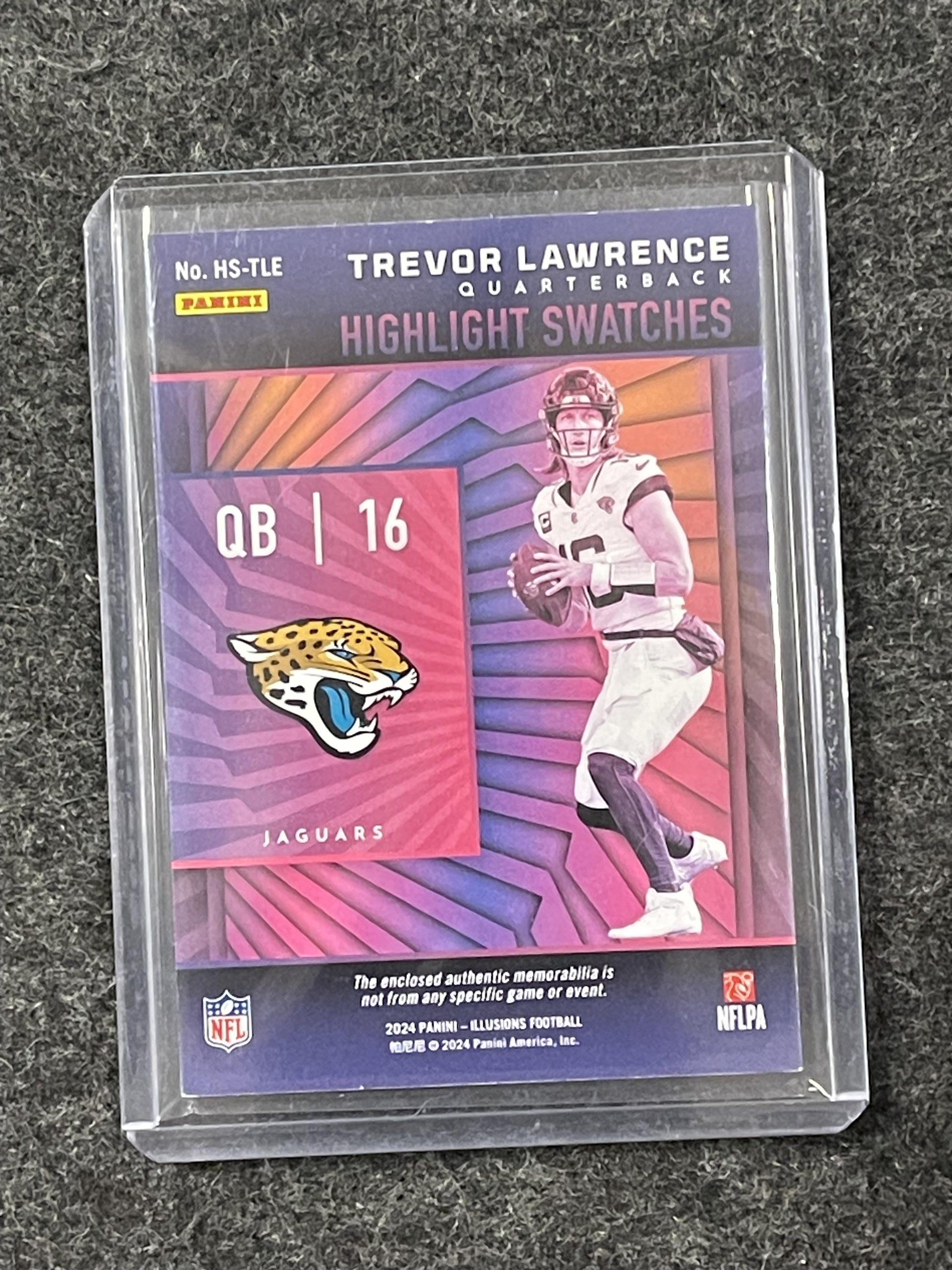 2024 Panini Illusions #HS-TLE Trevor Lawrence Highlight Swatches Red #/199 Jax