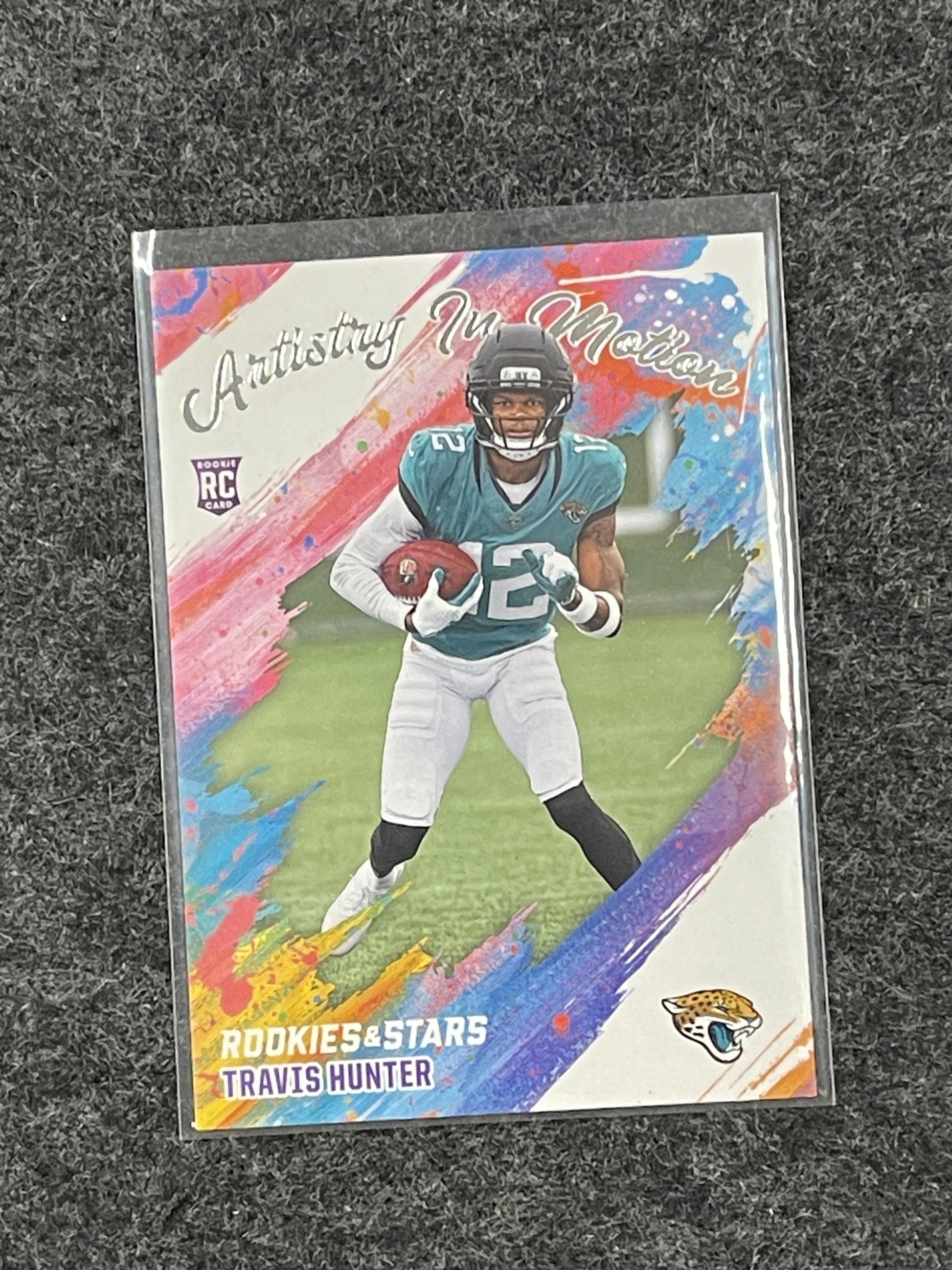2025 Panini Rookies & Stars #8 Travis Hunter Artistry in Motion Jax