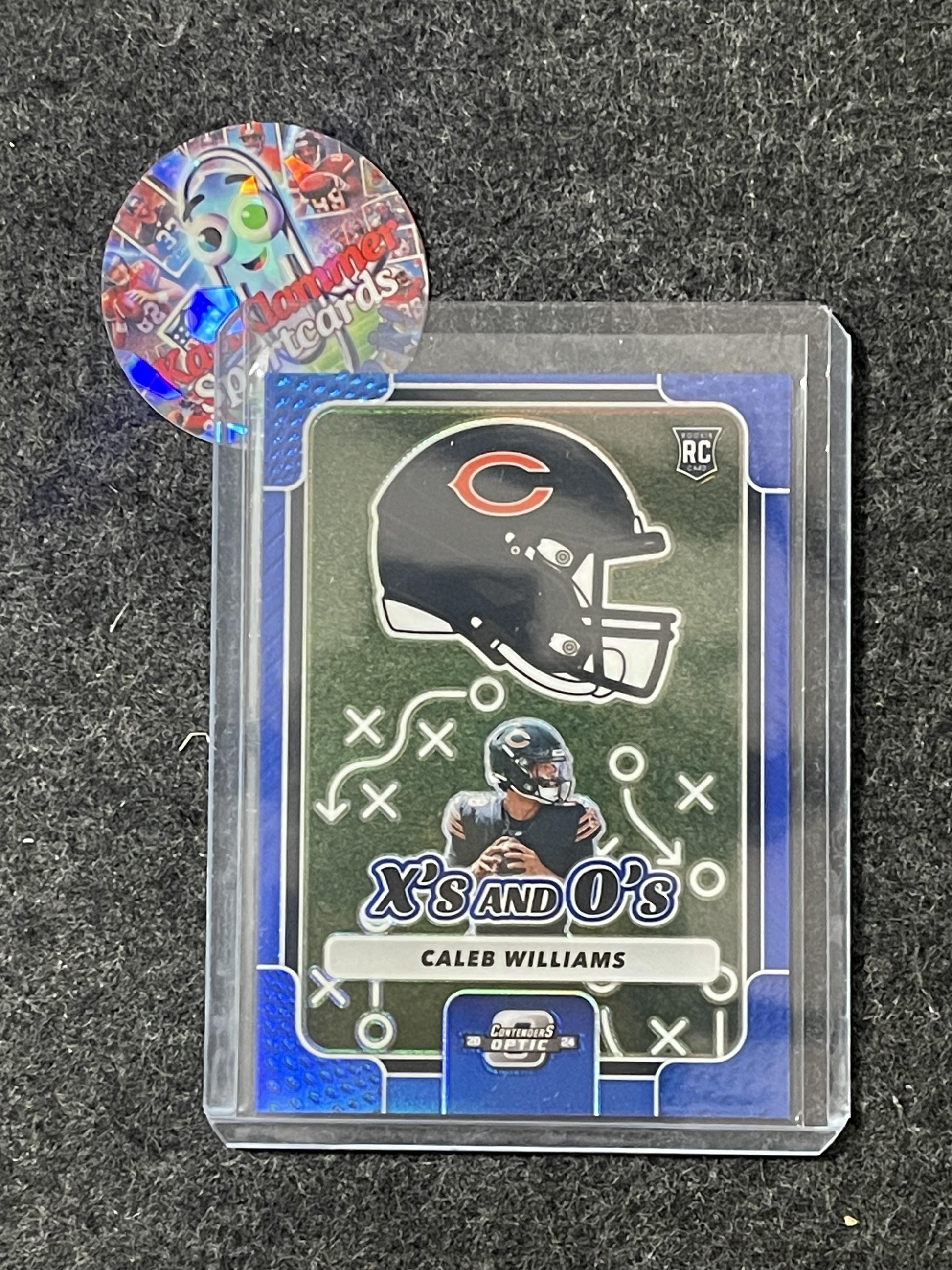 2024 Panini Contenders Optic #XO-CWS Caleb Williams Xs and Os Blue #/99 Chicago Bears SN