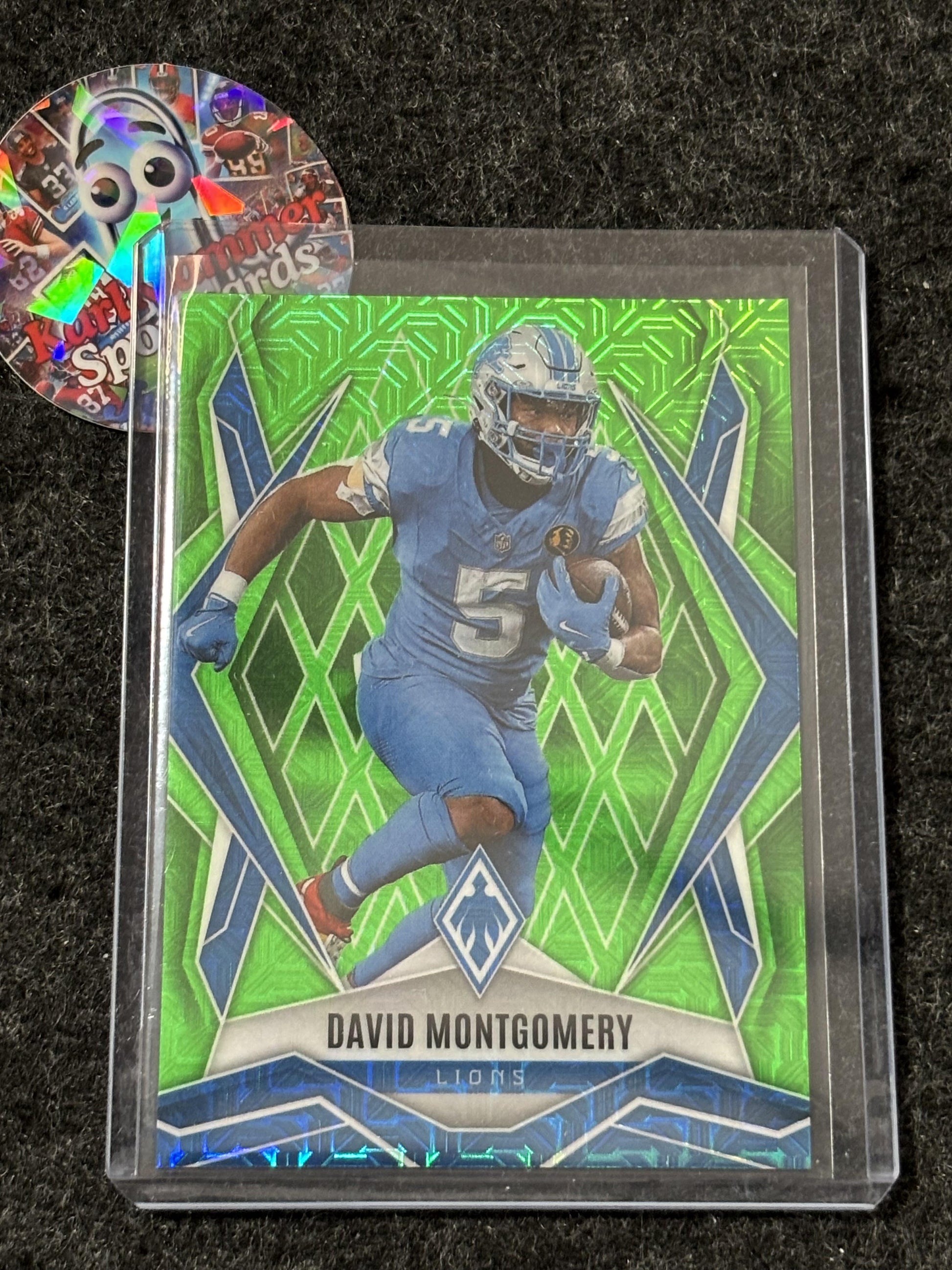 2025 Panini Phoenix #108 David Montgomery Lime Green Mojo Prizm #/75 Detroit Lions SN