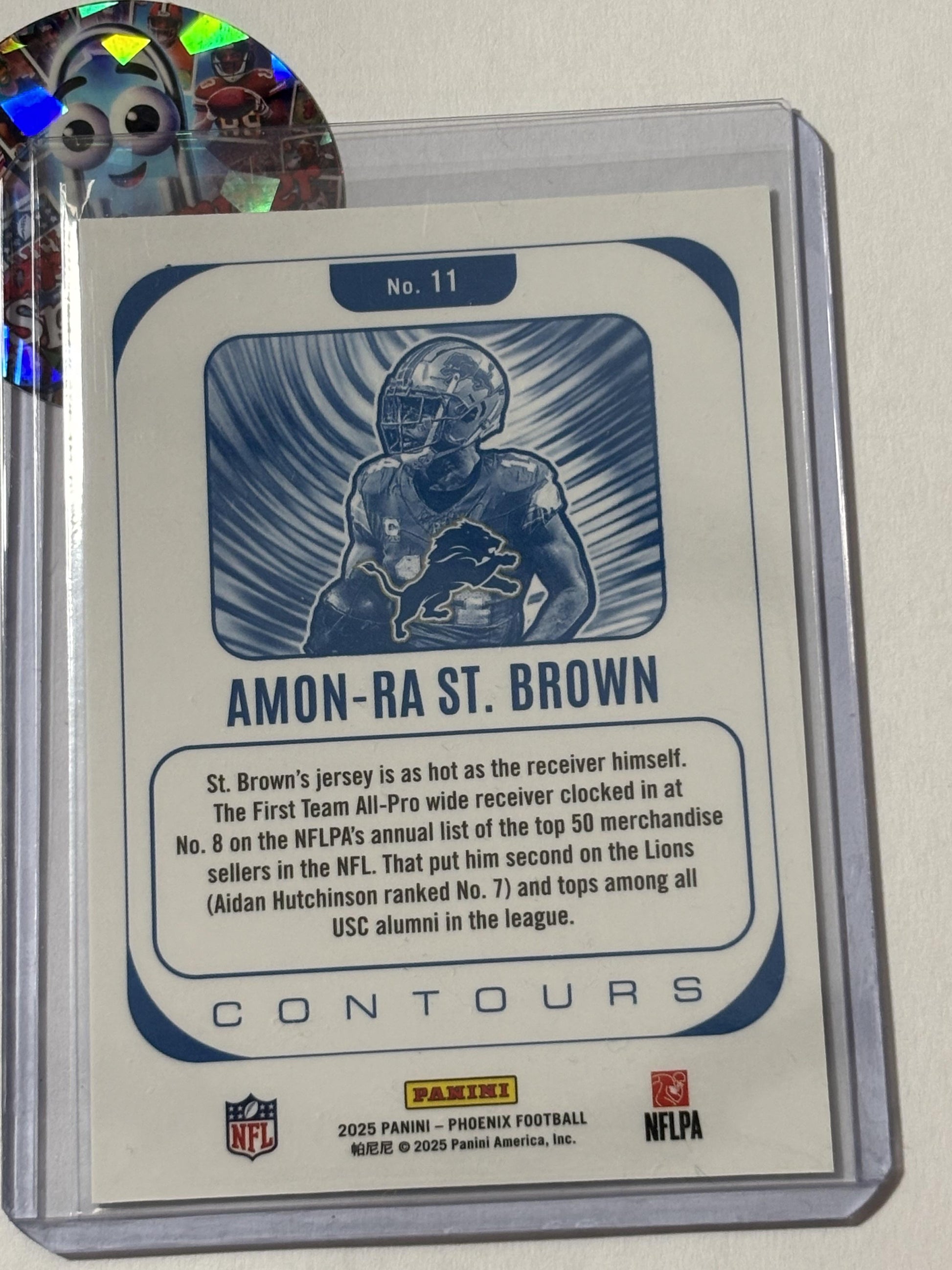 2025 Panini Phoenix #11 Amon-Ra St. Brown Contours Detroit Lions