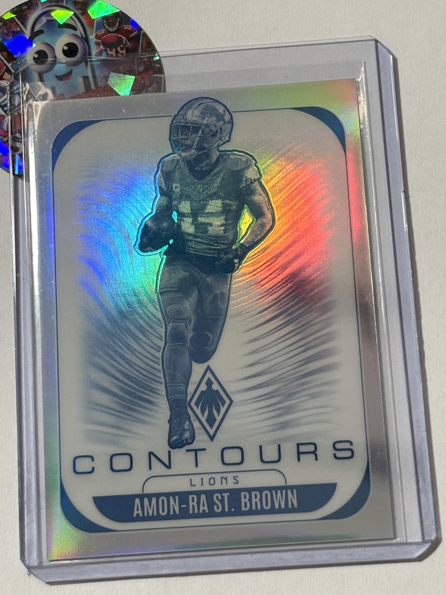 2025 Panini Phoenix #11 Amon-Ra St. Brown Contours Detroit Lions