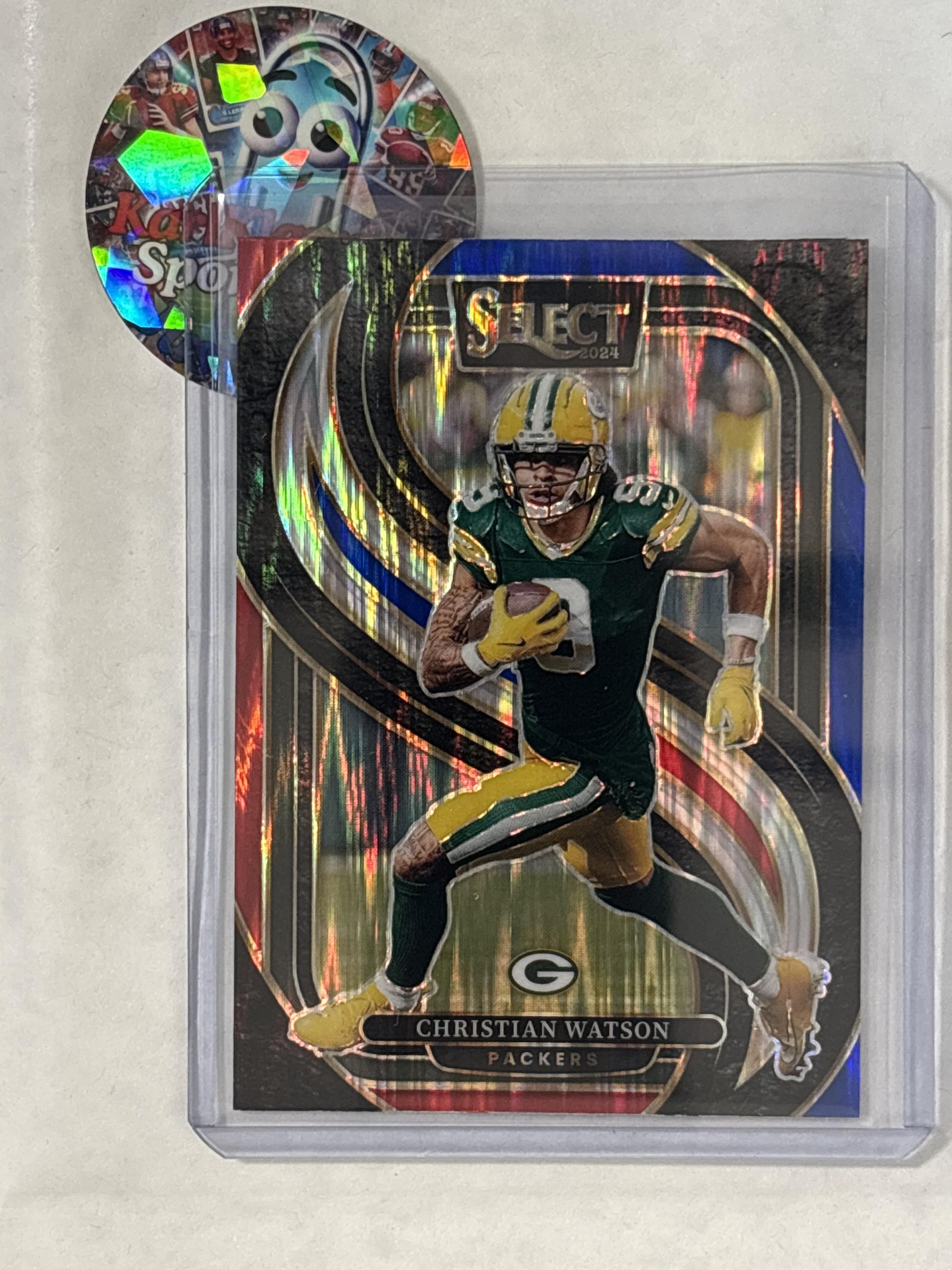 2024 Panini Select #138 Christian Watson Red & Blue Prizm Shock Green Bay Packers