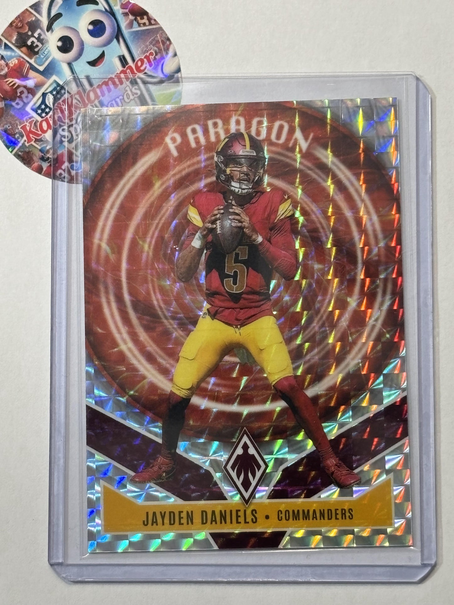 2025 Panini Phoenix #1 Jayden Daniels Paragon Silver Pyramids #/299 Washington Commanders SN