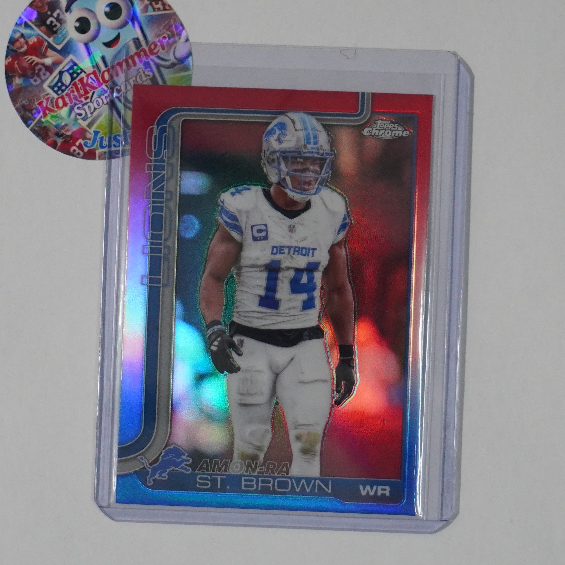 2025 Topps Chrome #98 Amon-Ra St. Brown Red White and Blue Refractor Lions