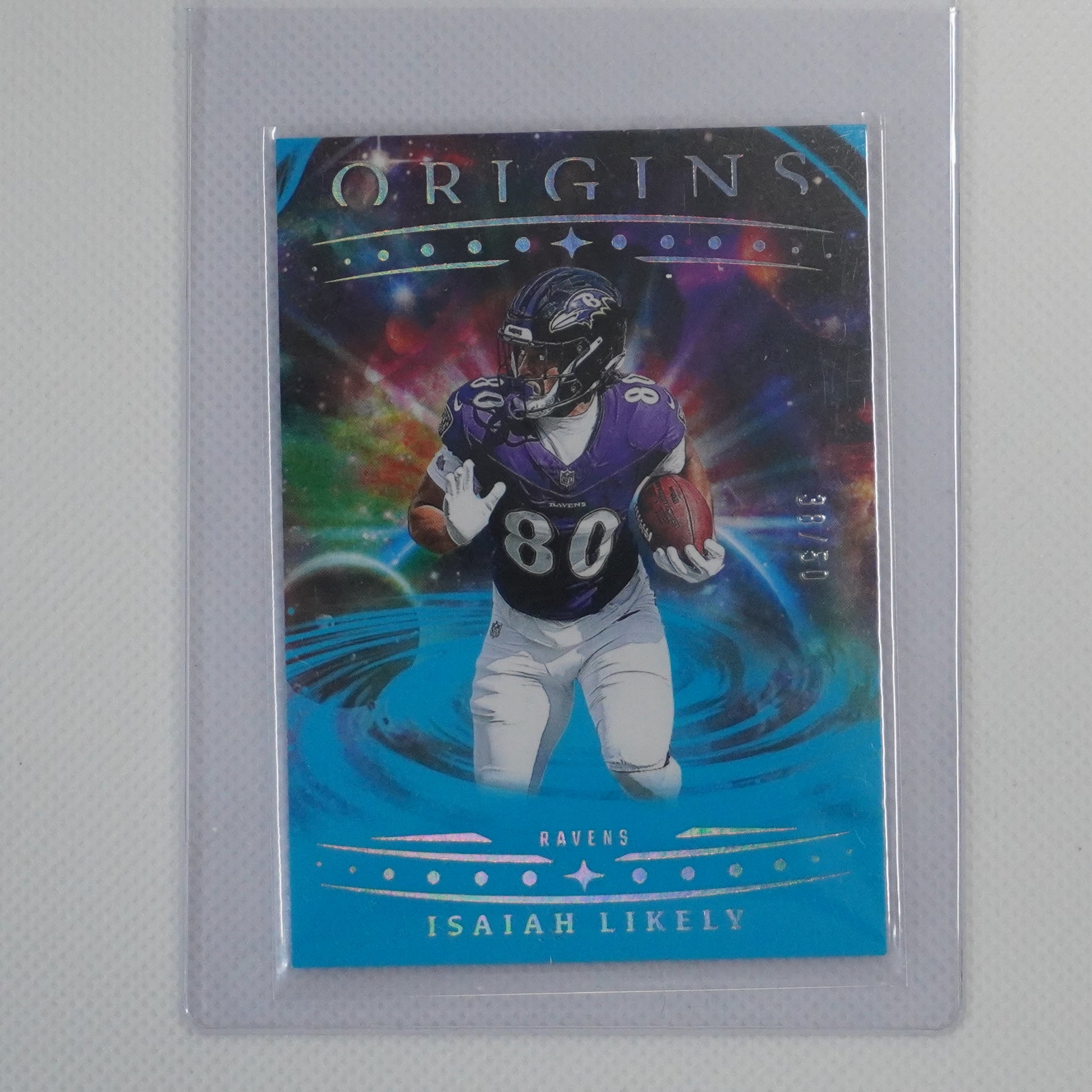 2025 Panini Origins #6 Isaiah Likely Blue #/99 Baltimore Ravens SN