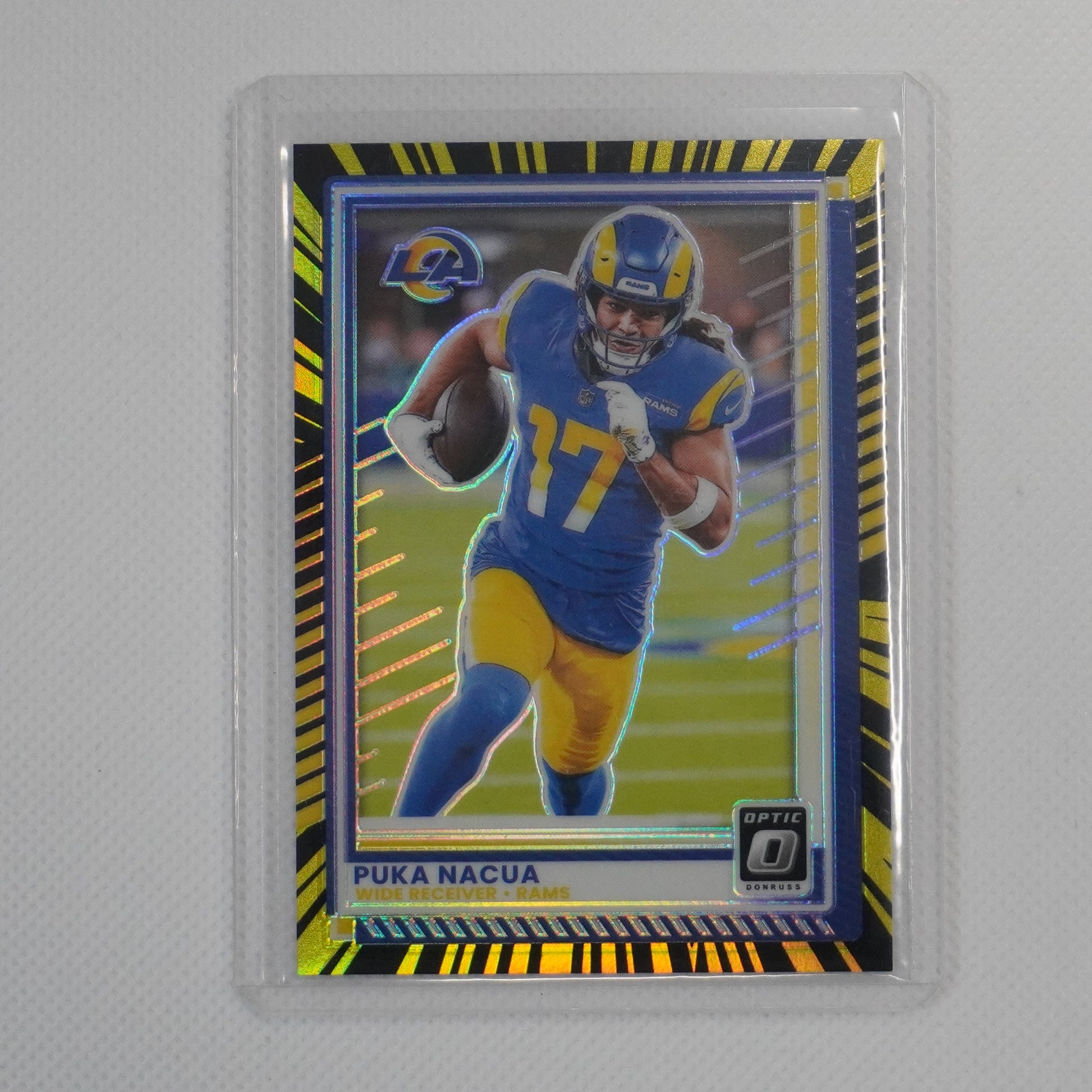 2025 Donruss Optic #192 Puka Nacua Electricity #/75 Los Angeles Rams SN