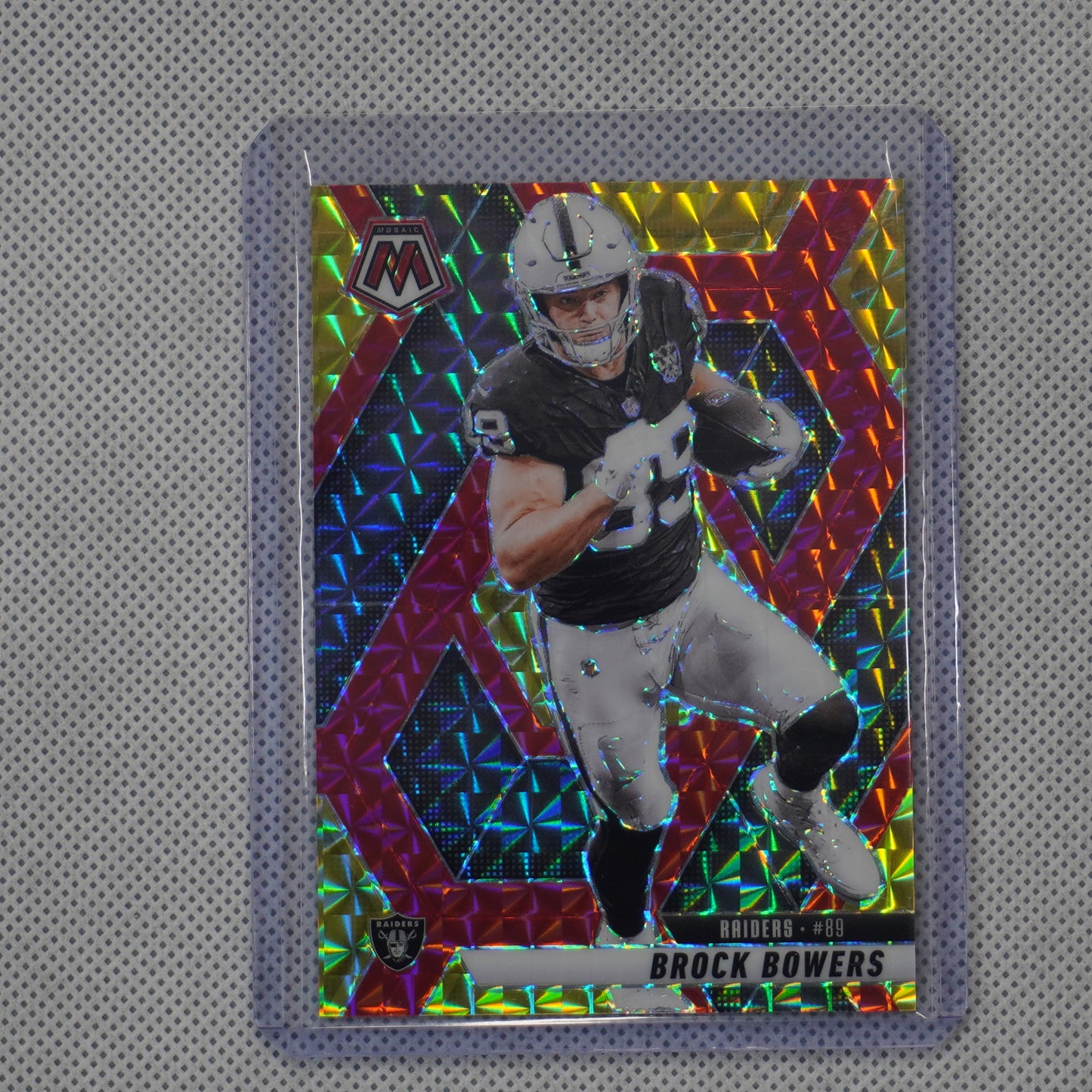 2025 Panini Mosaic #5 Brock Bowers Mosaic Choice Red & Yellow #/89 Raiders