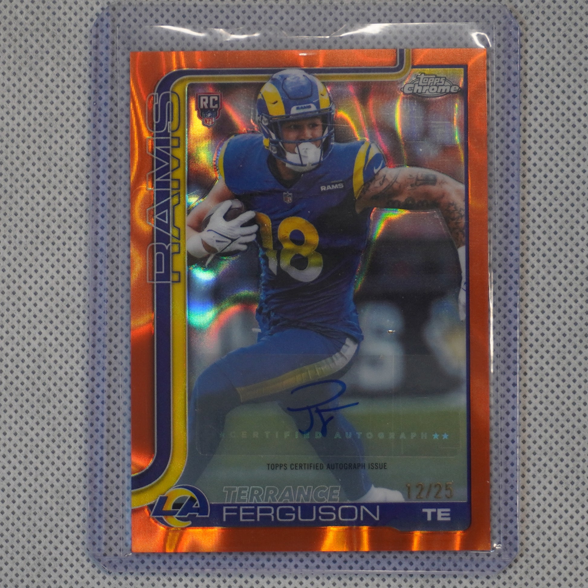 2025 Topps Chrome #RA-TFE Terrance Ferguson Chrome Rookie Autographs Orange Lava Refractor #/25 Los Angeles Rams SN.AU
