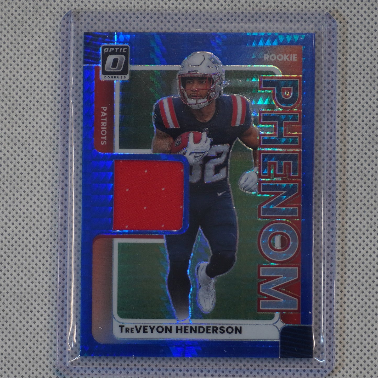 2025 Donruss Optic #RPBH-THN TreVeyon Henderson Rookie Phenoms Blue Hyper New England Patriots MEM