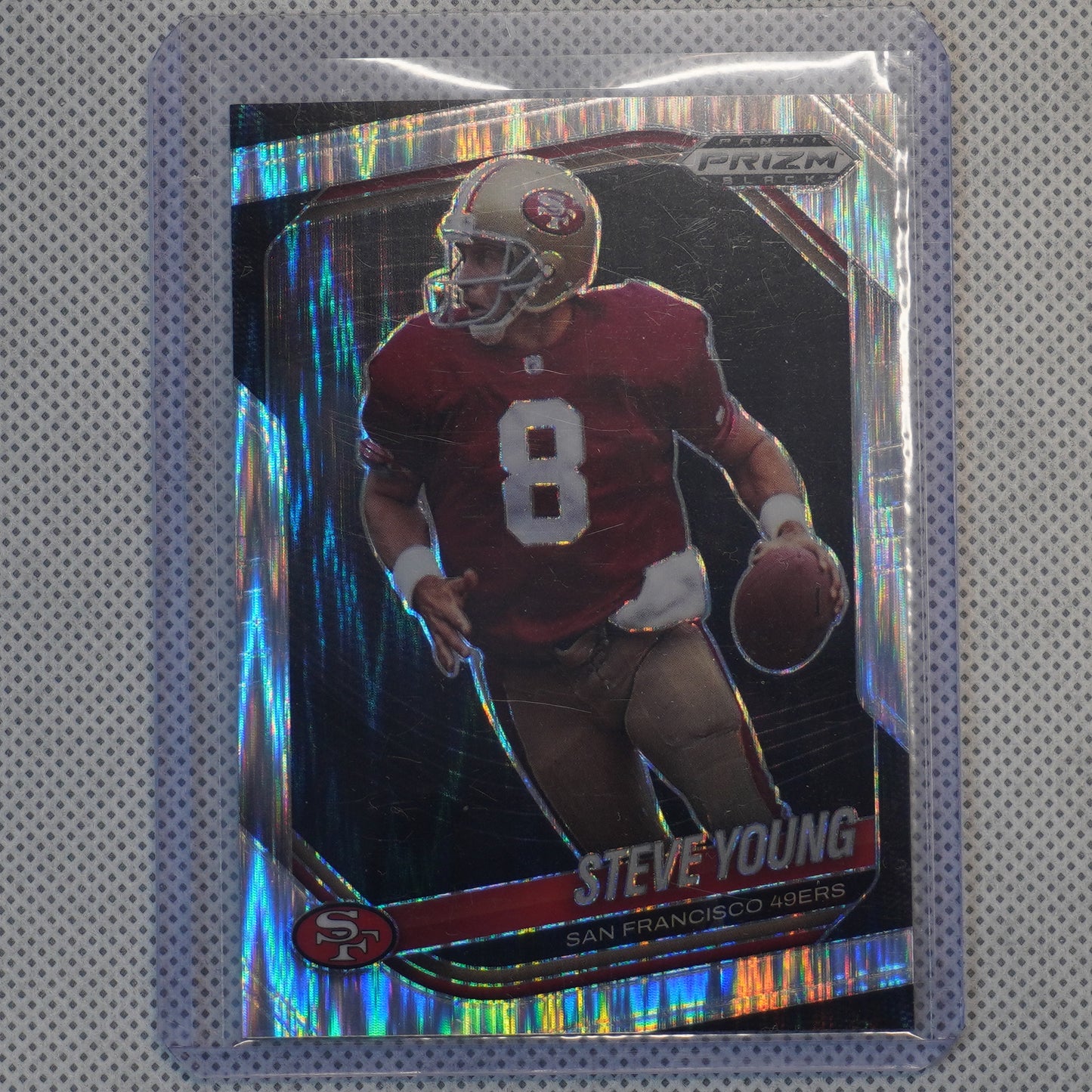 2025 Panini Prizm Black #132 Steve Young Prizms Skewed #/249 San Francisco 49ers SN