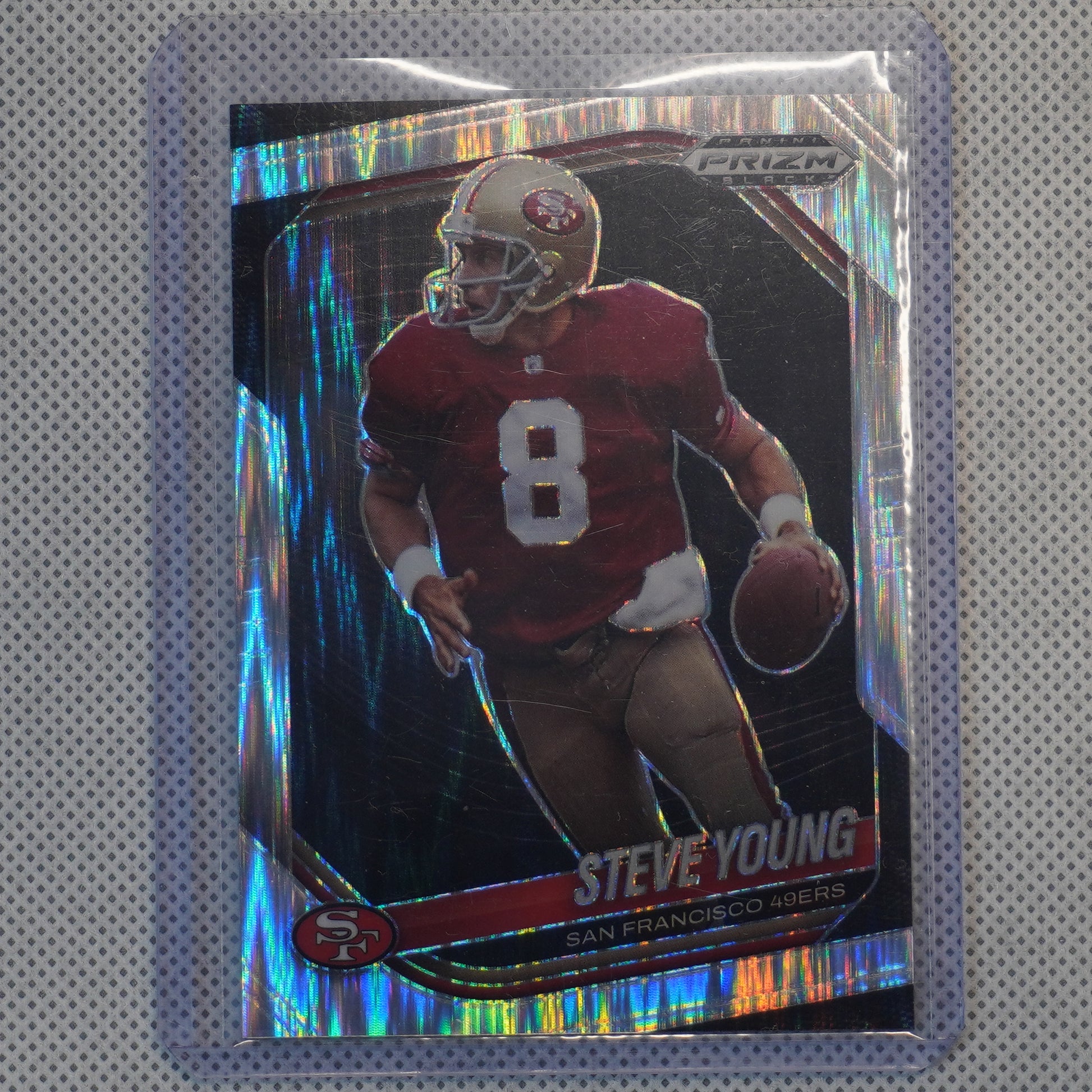 2025 Panini Prizm Black #132 Steve Young Prizms Skewed #/249 San Francisco 49ers SN