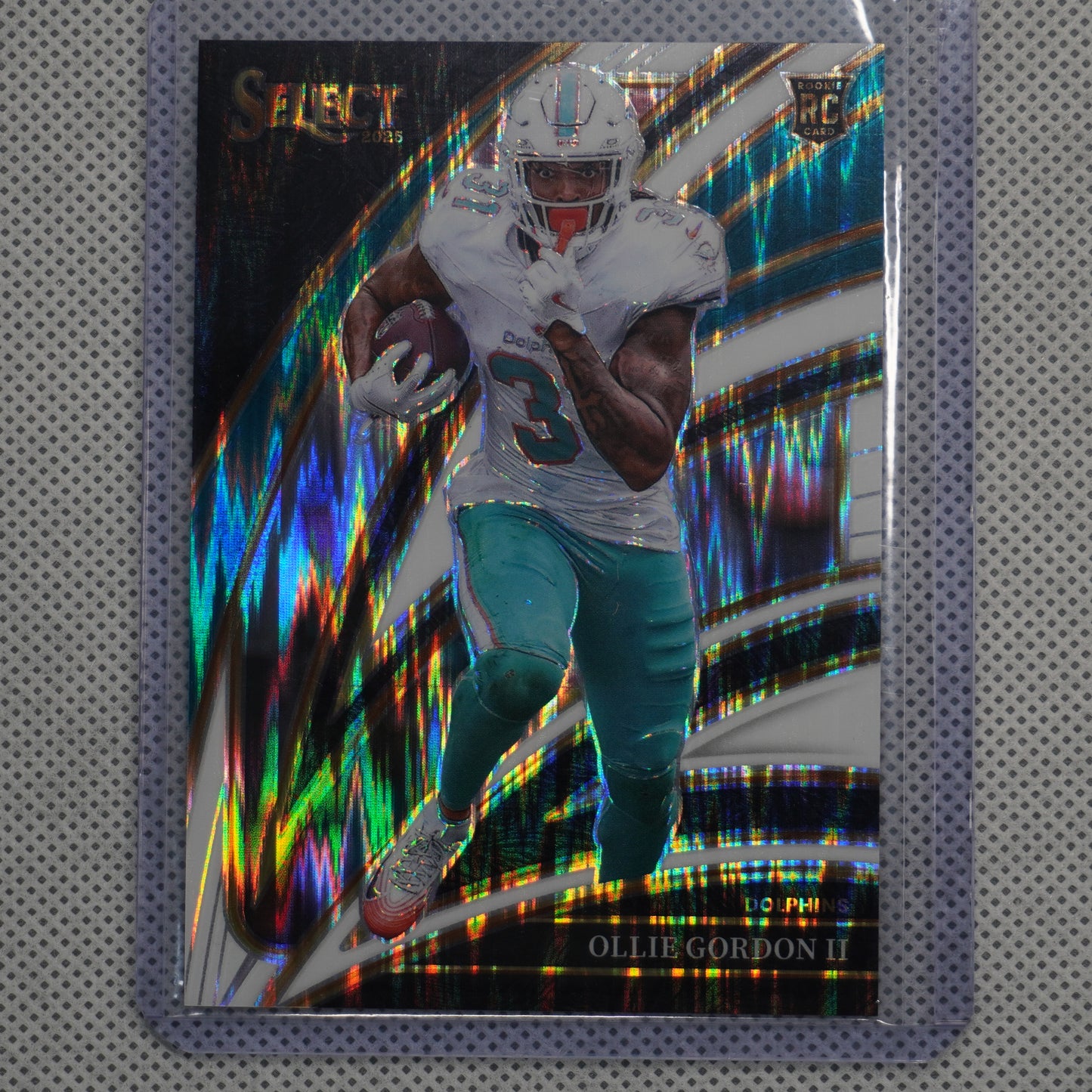 2025 Panini Select #281 Ollie Gordon II White Prizm Shock #/799 Miami Dolphins SN