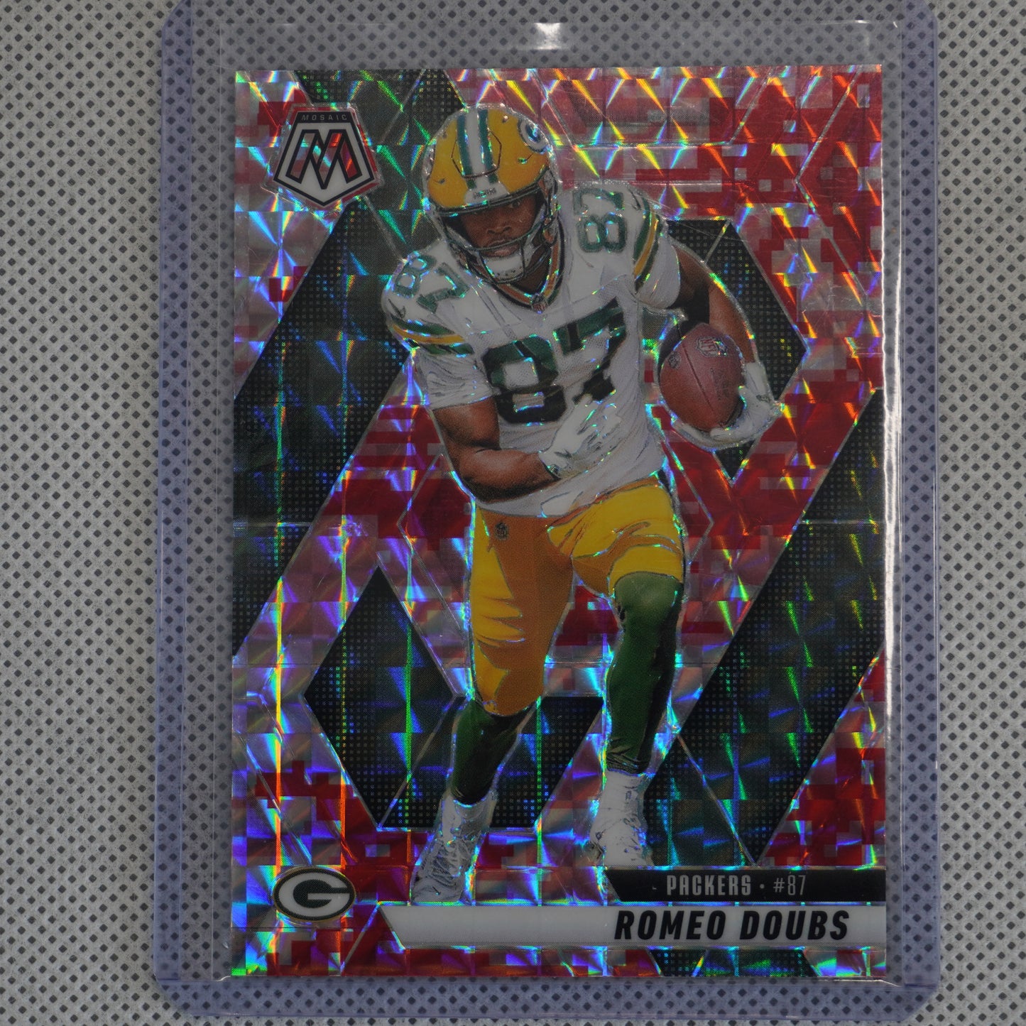 2025 Panini Mosaic #130 Romeo Doubs Mosaic Camo Pink Green Bay Packers