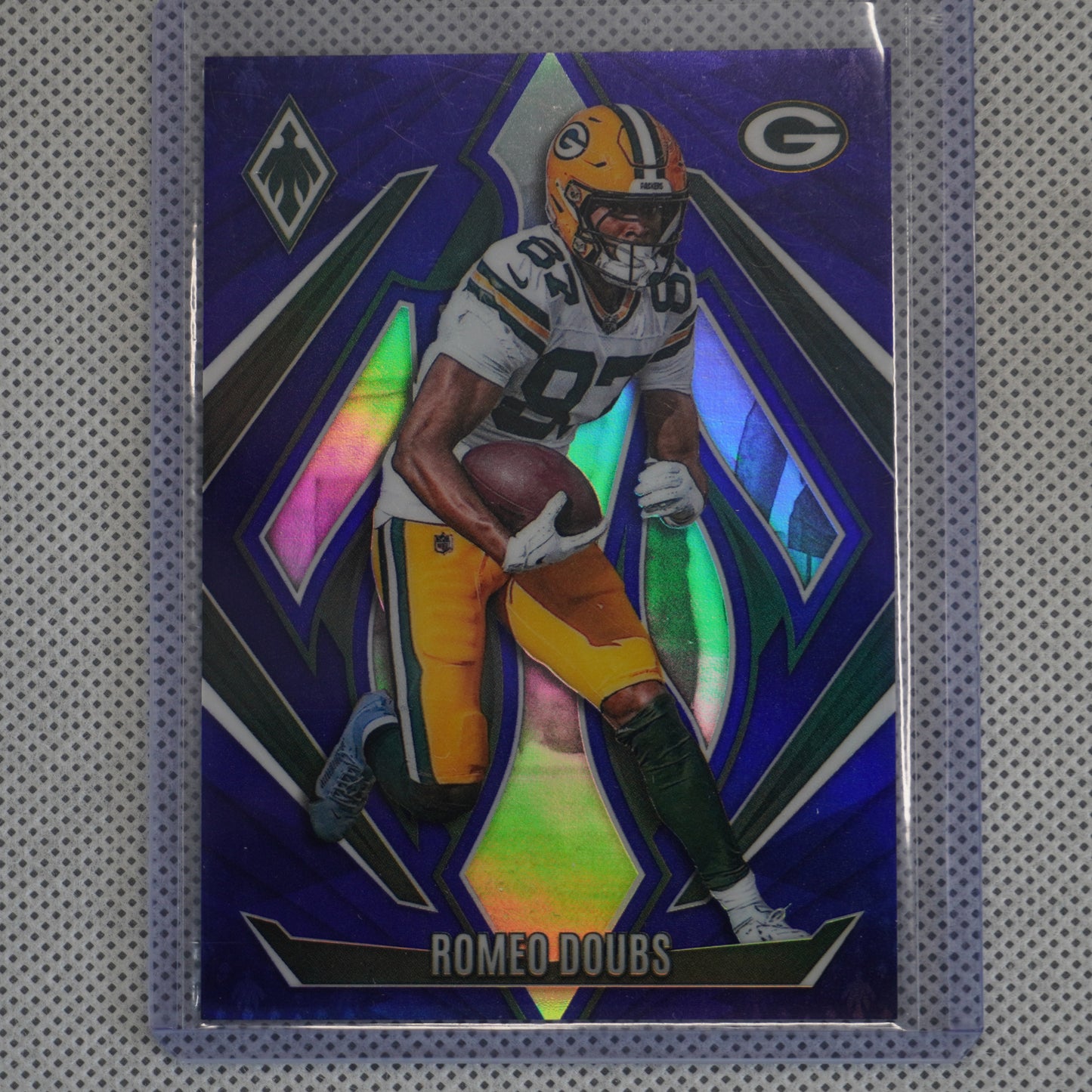 2024 Panini Phoenix #125 Romeo Doubs Purple Green Bay Packers