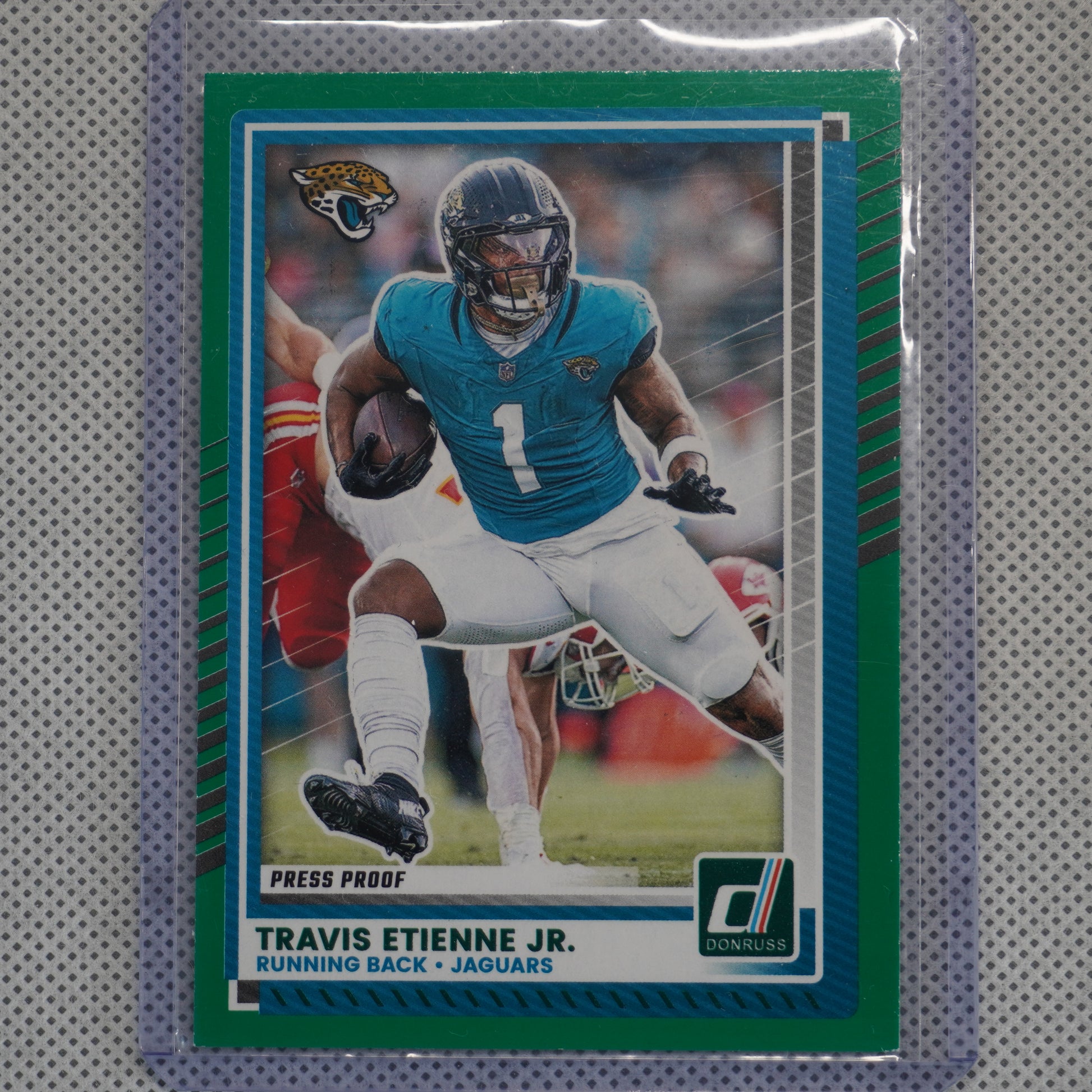 2025 Donruss #141 Travis Etienne Jr. Press Proofs Green Jacksonville Jaguars