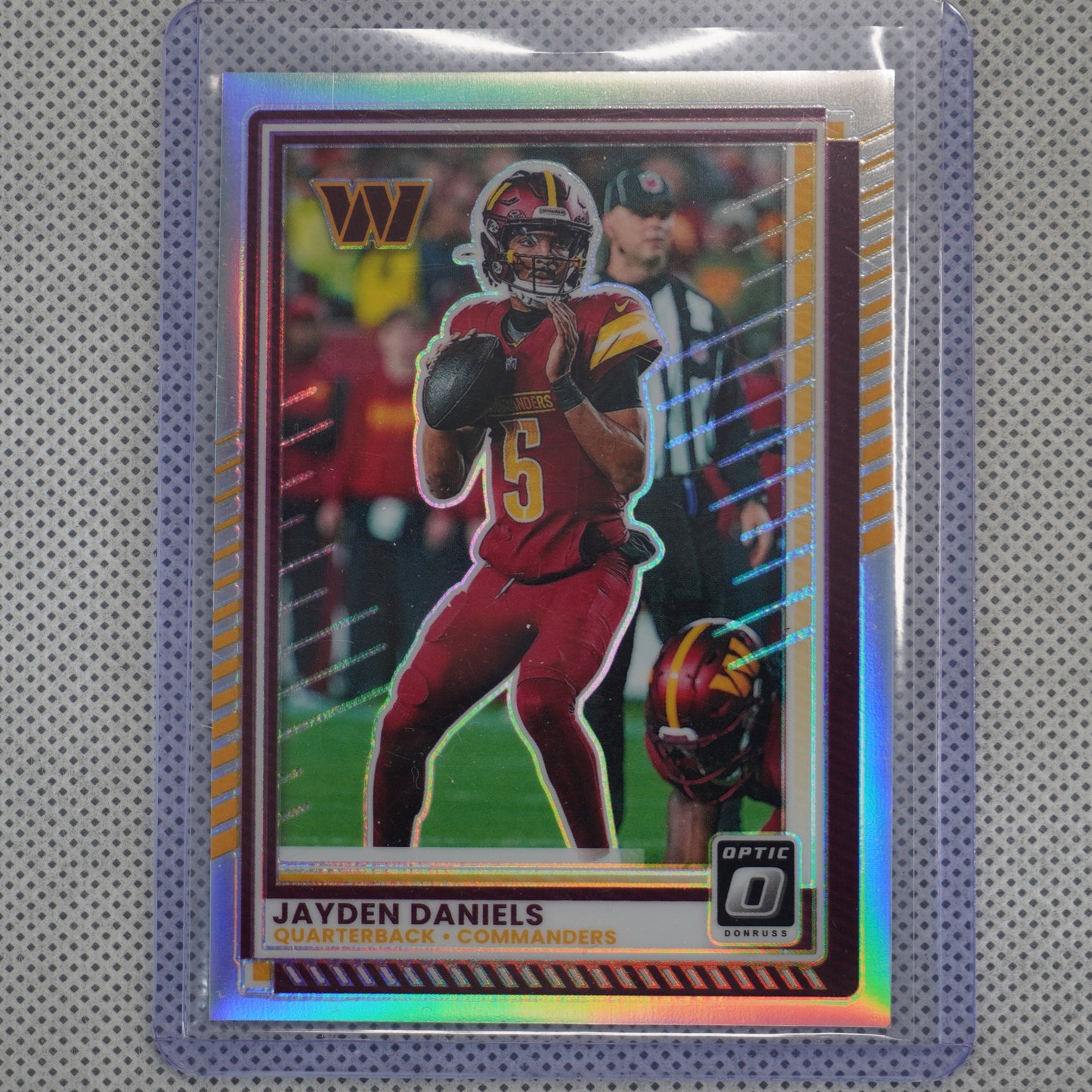 2025 Donruss Optic #23 Jayden Daniels Holo Washington Commanders