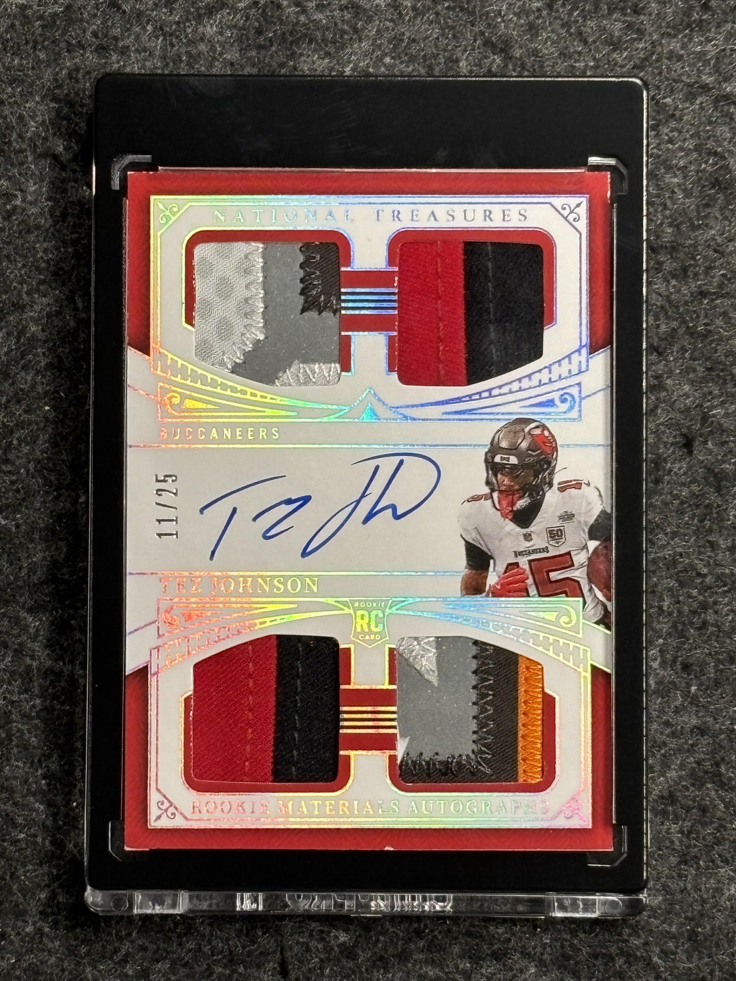 2025 Panini National Treasures #RMAQ-TJN Tez Johnson Rookie Materials Autographs Quad Holo Silver #/25 Tampa Bay Buccaneers SN,MEM,AU