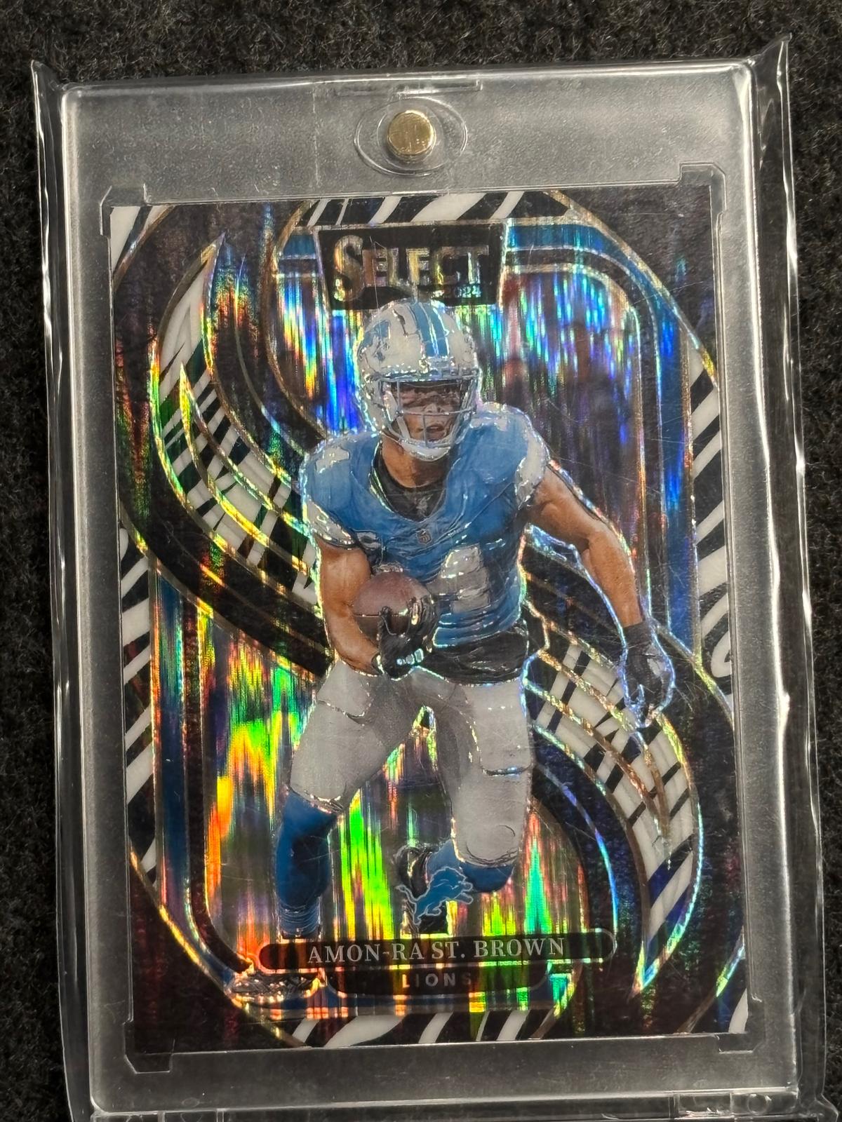2024 Panini Select #105 Amon-Ra St. Brown Zebra Prizm Detroit Lions