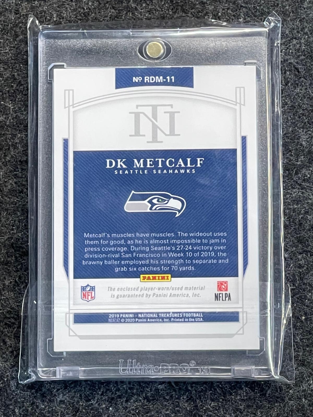 2019 Panini National Treasures #RDM-11 DK Metcalf Rookie Dual Materials Holo Gold #/10 Seattle Seahawks SN, MEM