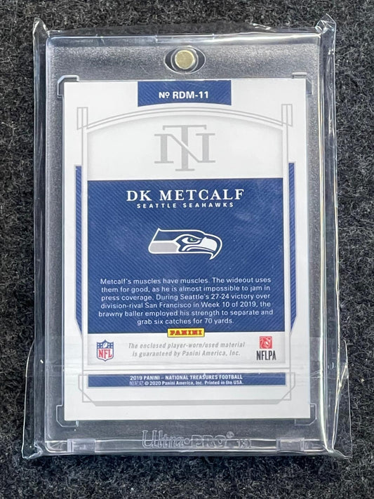 2019 Panini National Treasures #RDM-11 DK Metcalf Rookie Dual Materials Holo Gold #/10 Seattle Seahawks SN, MEM